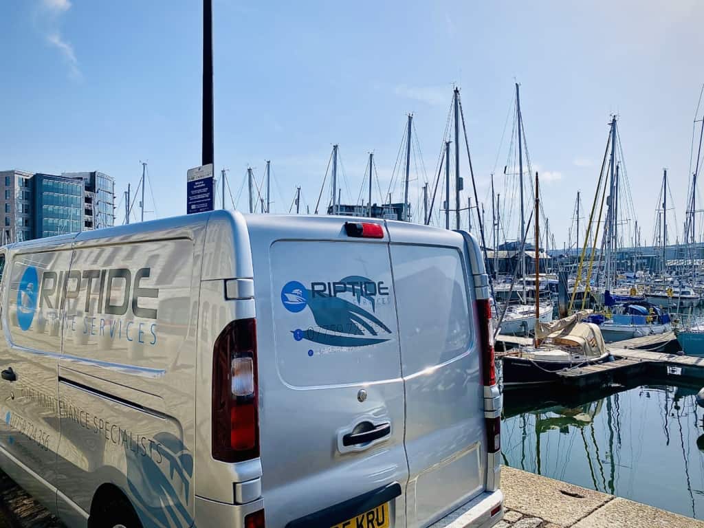 Mobile boat mechanic attending a harbour to carry out repairs to a yacht